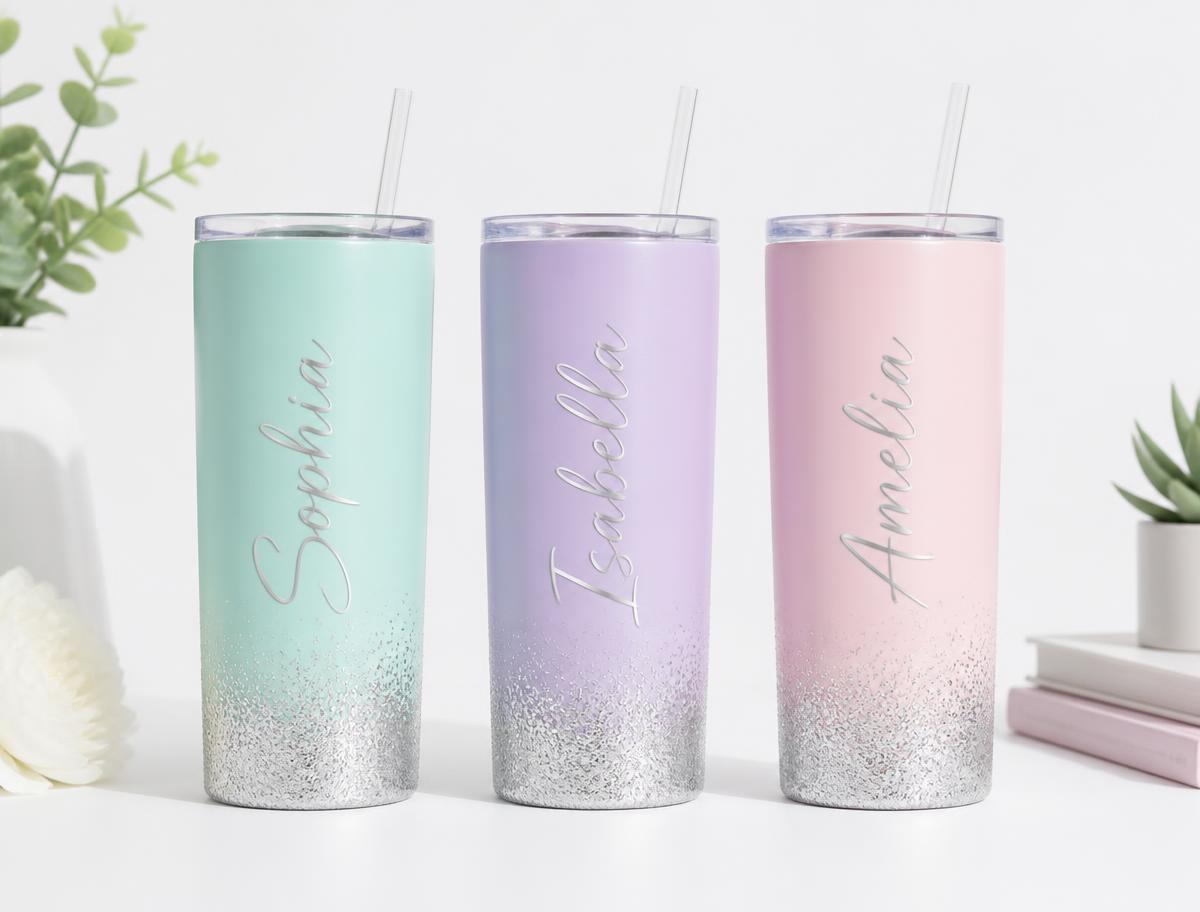 Three pastel personalised tumblers in mint, lilac and pink with silver glitter bases